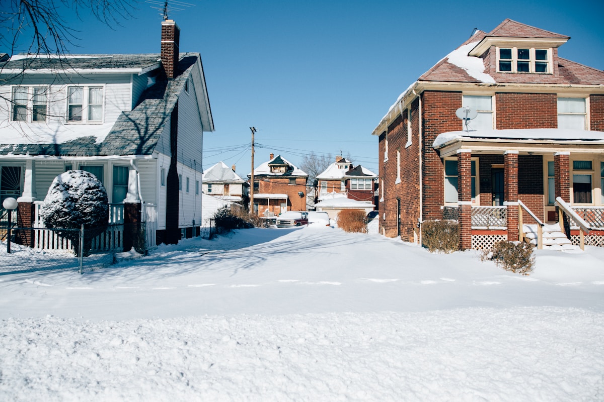 Buffalo neighborhood homes in winter snow — home winterization guide