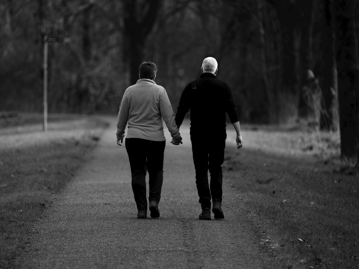 Senior woman walking outdoors in Buffalo, NY winter sunlight